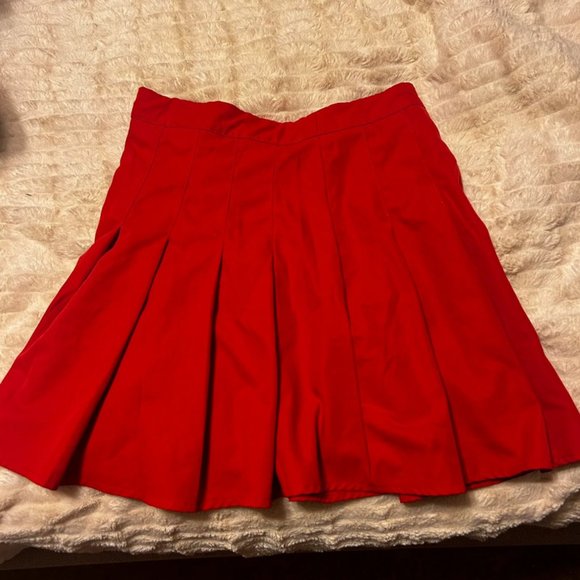 Red pleated skirt